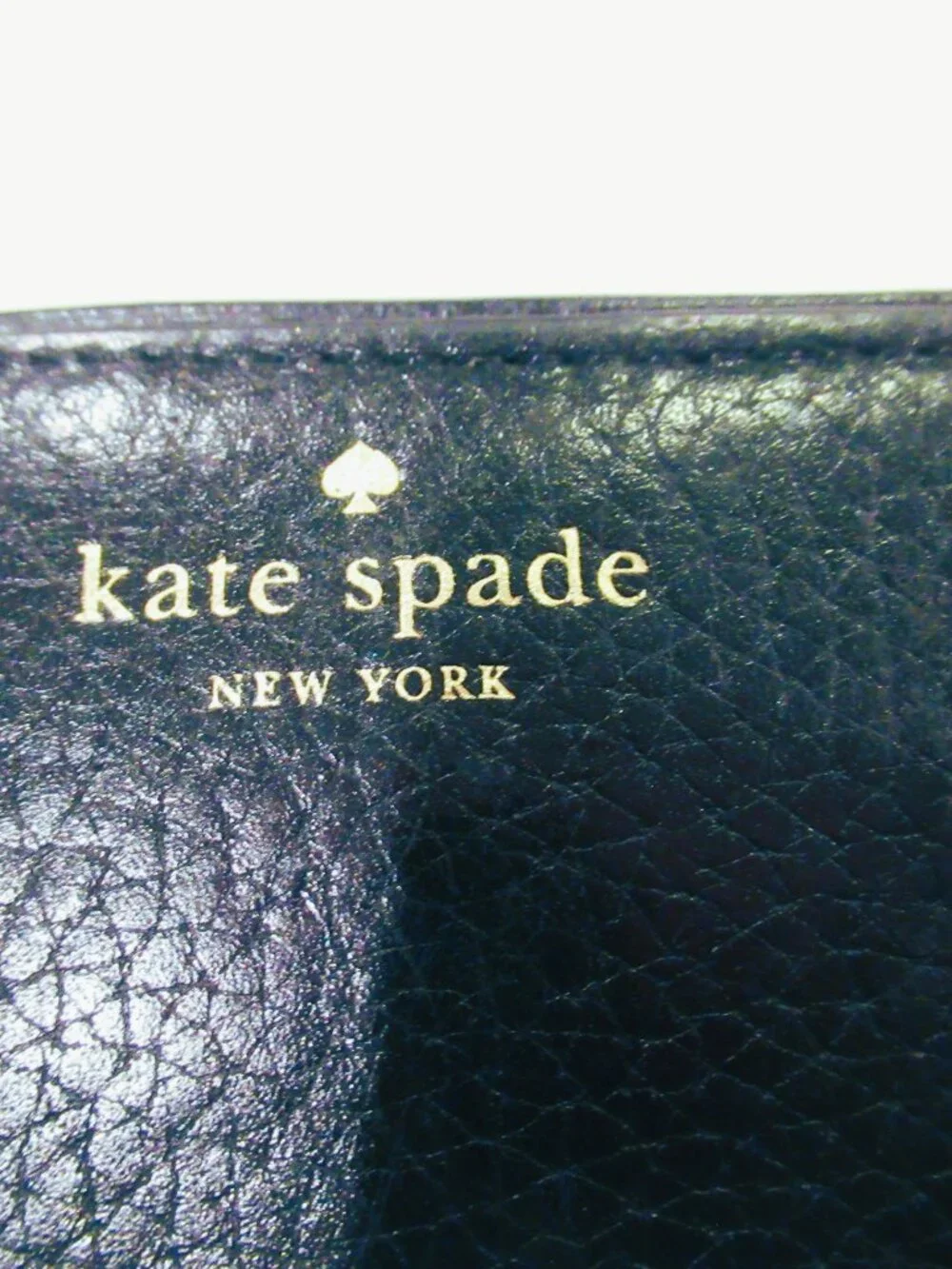 Kate Spade New York black leather wristlet / wallet